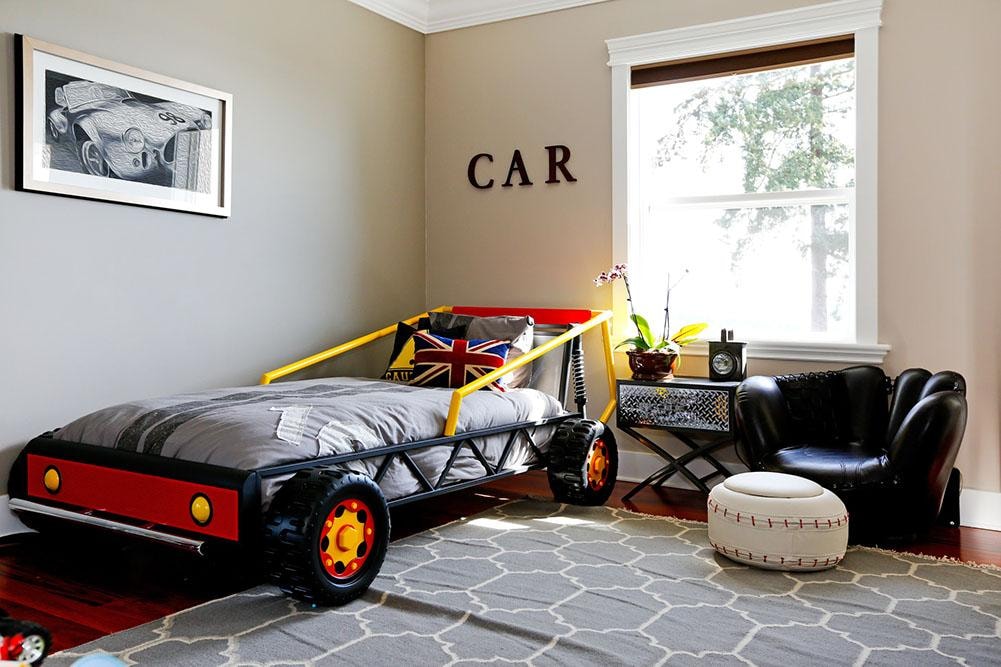 Fun children's bedroom with race car bed and automotive decor